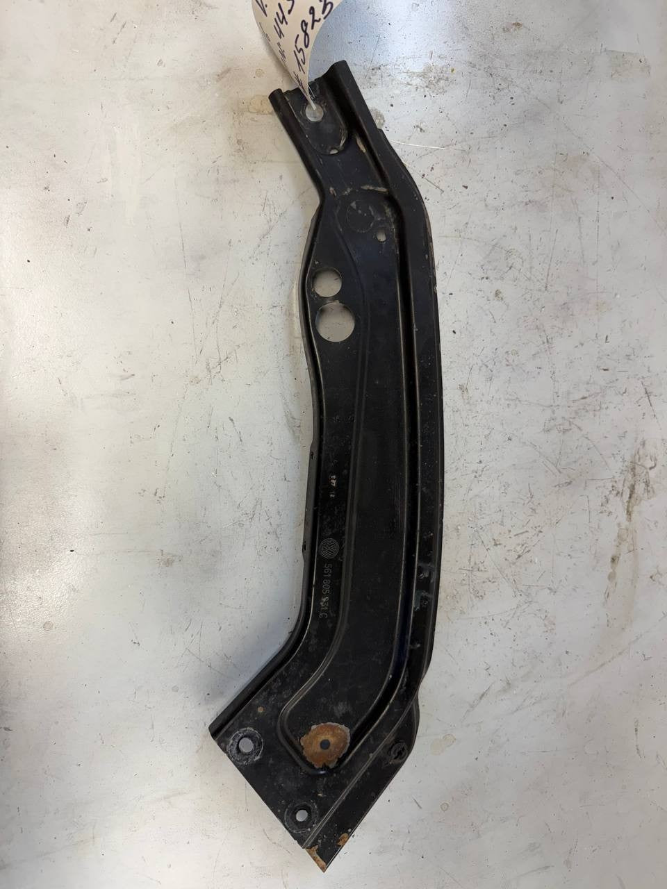 2016 VW Passat Front Headlight Mount Bracket 561805931C OEM Used